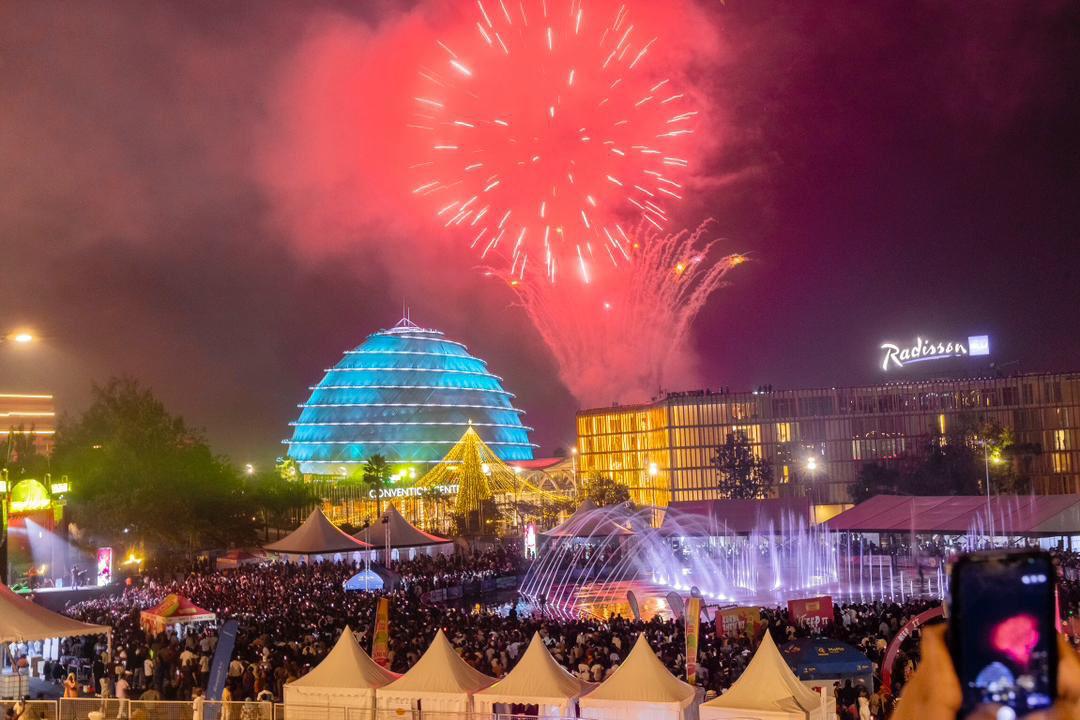 Fireworks over the Kigali Convention Centre dome during a night celebration
